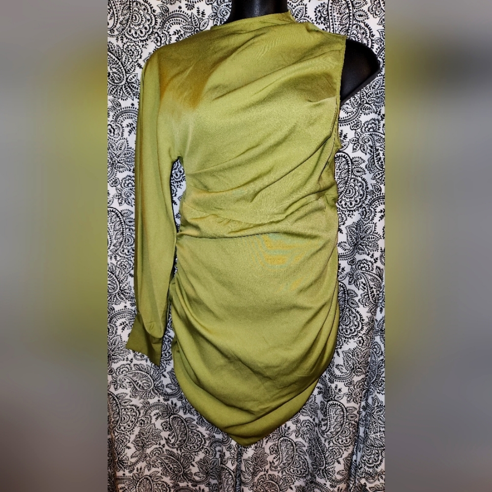 One sleeved light green dress with rushing on sides and in back